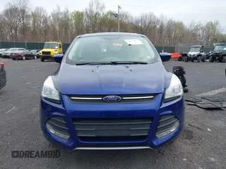 2015 Ford Escape SE with VIN 1FMCU9GX4FUC73125, listed as a IAAI auction lot 42071815 with 71,681 mi miles. Bid and sale history available at carsss.com. Image 12.