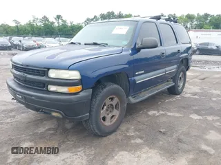 2003 Chevrolet Tahoe LS z VIN 1GNEK13T73J244424, wystawiony jako IAAI lot #42284777 z przebiegiem 233 833 mil mil oraz . Historia ofert i sprzedaży dostępna na DreamBid. Obrazek 2.