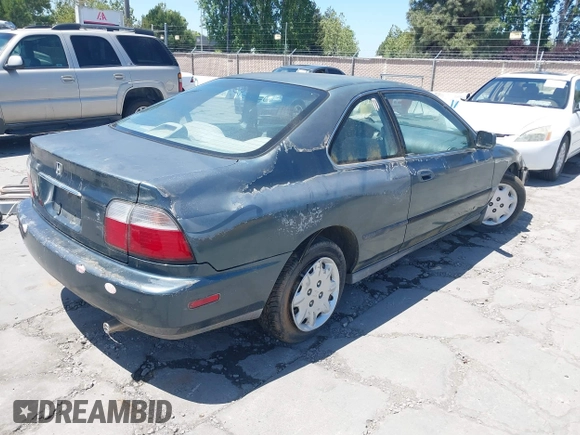 1996 Honda Accord LX with VIN 1HGCD7233TA023922, listed as a IAAI auction lot 42203135 with 239,677 mi miles and . Bid and sale history available at carsss.com. Image 4.