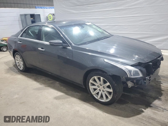 2014 Cadillac CTS Luxury AWD z VIN 1G6AX5SX5E0185132, wystawiony jako Copart lot #52292465 z przebiegiem 69 344 mil mil oraz Szkoda całkowita • Salvage title. Historia ofert i sprzedaży dostępna na DreamBid. Obrazek 4.