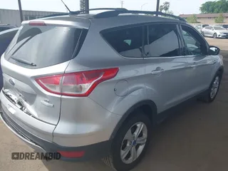 2013 Ford Escape SE with VIN 1FMCU0GX5DUB97293, listed as a IAAI auction lot 42044696 with 182,746 mi miles and . Bid and sale history available at DreamBid. Image 4.