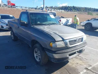 1998 Mazda B-Series Truck SX with VIN 4F4YR12C5WTM12452, listed as a IAAI auction lot 41705238 with 85,167 mi miles and . Bid and sale history available at DreamBid. Image 1.