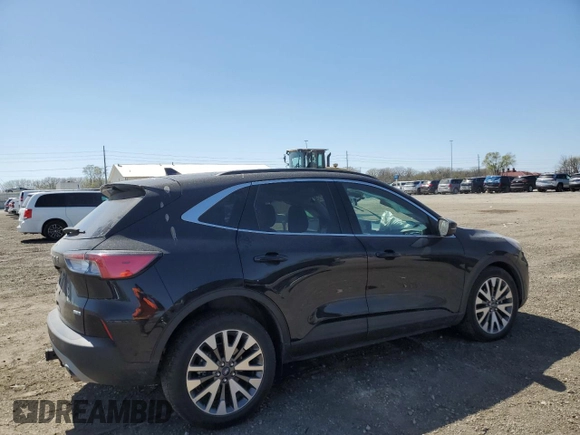 2020 Ford Escape Titanium with VIN 1FMCU9J97LUA55895, listed as a Copart auction lot 53058785 with 70,988 mi miles and Salvage title. Bid and sale history available at DreamBid. Image 3.