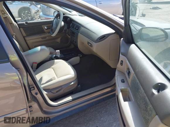 2002 Ford Taurus SES Standard with VIN 1FAFP55U52A156214, listed as a IAAI auction lot 41803668 with 31,693 mi miles. Bid and sale history available at carsss.com. Image 5.