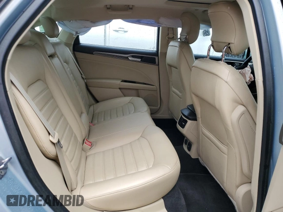 2013 Ford Fusion SE Hybrid z VIN 3FA6P0LU6DR174719, wystawiony jako Copart lot #62877715 z przebiegiem 52 884 mil mil oraz Szkoda całkowita • Salvage title. Historia ofert i sprzedaży dostępna na DreamBid. Obrazek 10.