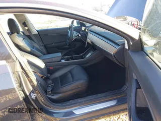 2020 Tesla Model 3 Long Range with VIN 5YJ3E1EB9LF795408, listed as a IAAI auction lot 41735428 with 56,013 mi miles. Bid and sale history available at carsss.com. Image 5.
