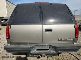 1999 Chevrolet Tahoe with VIN 1GNEC13R6XJ494812, listed as a Copart auction lot 76398254 with 299,584 mi miles and Salvage Title. Bid and sale history available at carsss.com. Image 6.
