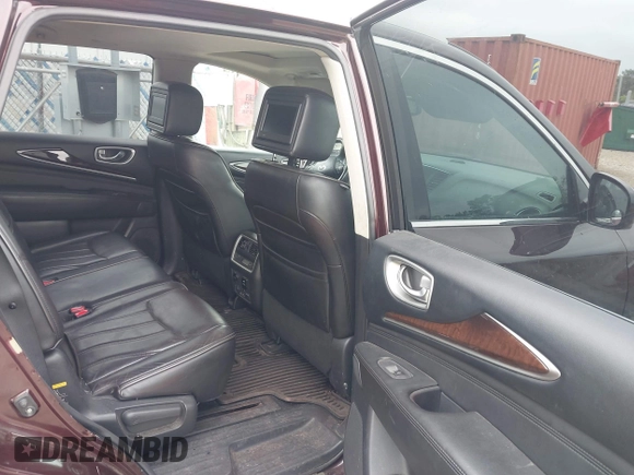 2015 Infiniti QX60 with VIN 5N1AL0MM7FC521700, listed as a IAAI auction lot 42310389 with 144,217 mi miles and . Bid and sale history available at DreamBid. Image 8.