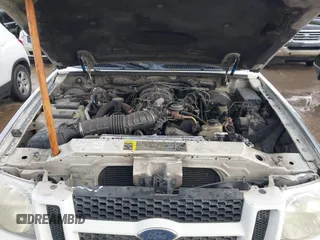 2004 Ford Explorer Sport Trac XLS z VIN 1FMZU67K04UA15789, wystawiony jako IAAI lot #42668387 z przebiegiem 358 240 mil mil oraz . Historia ofert i sprzedaży dostępna na DreamBid. Obrazek 10.