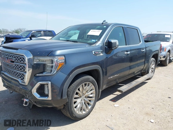 2019 GMC Sierra 1500 Denali z VIN 1GTU9FEL5KZ387012, wystawiony jako IAAI lot #42002743 z przebiegiem 124 718 mil mil oraz . Historia ofert i sprzedaży dostępna na DreamBid. Obrazek 17.
