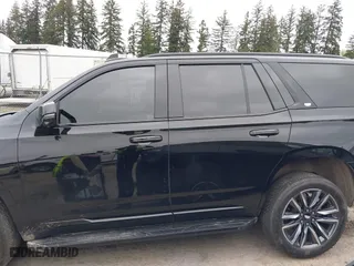 2023 Cadillac Escalade 4WD Sport with VIN 1GYS4EKL7PR185858, listed as a IAAI auction lot 39413690 with 32,987 mi miles. Bid and sale history available at carsss.com. Image 14.