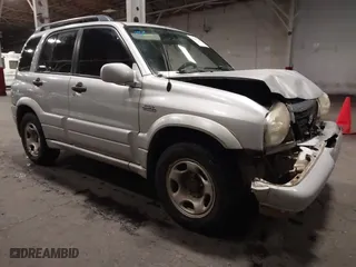 2002 Suzuki Grand Vitara JLX with VIN JS3TD62V324161291, listed as a IAAI auction lot 41577344 with 164,658 mi miles. Bid and sale history available at carsss.com. Image 1.