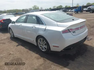 2016 Lincoln MKZ with VIN 3LN6L2G94GR633849, listed as a IAAI auction lot 42157808 with 118,678 mi miles and . Bid and sale history available at carsss.com. Image 3.