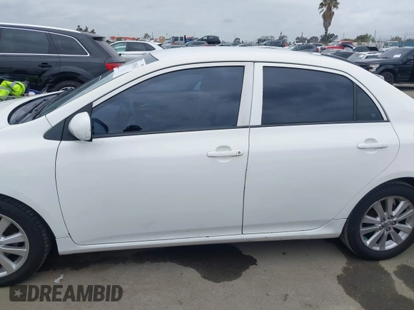 2010 Toyota Corolla with VIN 2T1BU4EE0AC359882, listed as a IAAI auction lot 42051633 with 227,481 mi miles. Bid and sale history available at carsss.com. Image 14.