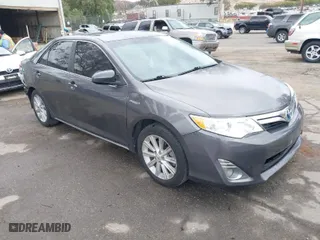 2013 Toyota Camry Hybrid LE with VIN 4T1BD1FK1DU091687, listed as a IAAI auction lot 42046450 with 211,895 mi miles. Bid and sale history available at carsss.com. Image 1.