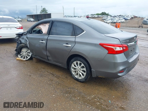2019 Nissan Sentra S z VIN 3N1AB7AP7KY364754, wystawiony jako IAAI lot #42056332 z przebiegiem 170 068 mil mil oraz . Historia ofert i sprzedaży dostępna na DreamBid. Obrazek 3.