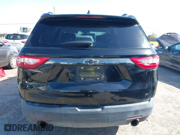 2019 Chevrolet Traverse LT Cloth z VIN 1GNEVGKW7KJ208656, wystawiony jako IAAI lot #42373422 z przebiegiem 132 863 mil mil oraz . Historia ofert i sprzedaży dostępna na DreamBid. Obrazek 17.