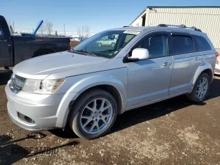 2012 Dodge Journey SXT z VIN 3C4PDCCG7CT135822, wystawiony jako Copart lot #48820205 z przebiegiem 253 183 mil mil oraz Czysty tytuł • Clean title. Historia ofert i sprzedaży dostępna na DreamBid. Obrazek 1.