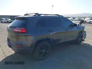 2014 Jeep Cherokee Latitude with VIN 1C4PJMCBXEW317384, listed as a IAAI auction lot 41621635 with 180,971 mi miles and . Bid and sale history available at DreamBid. Image 4.