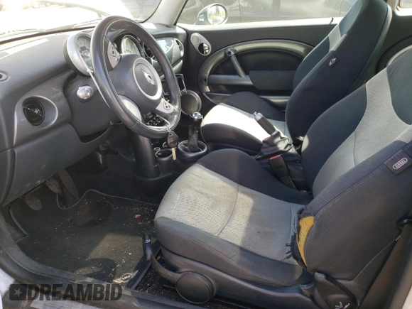 2006 MINI Hardtop with VIN WMWRC33546TK70683, listed as a Copart auction lot 54929365 with 109,484 mi miles and Salvage title. Bid and sale history available at DreamBid. Image 7.