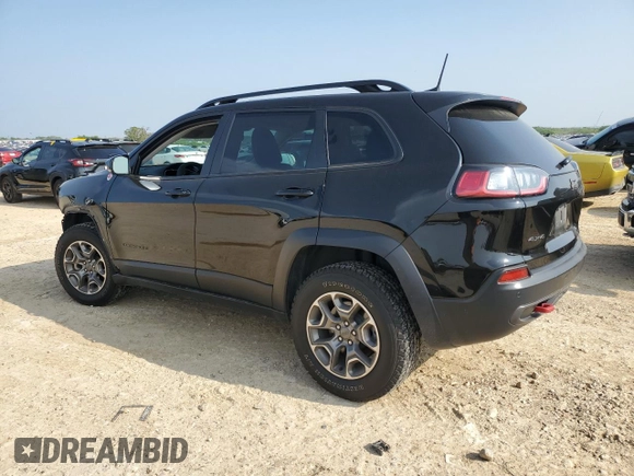 2022 Jeep Cherokee Trailhawk с VIN 1C4PJMBX8ND502686, выставлен на аукционе Copart как лот 51180645 с пробегом 62 865 миль миль и Списание • Salvage title. История ставок и продаж доступна на DreamBid. Изображение 2.