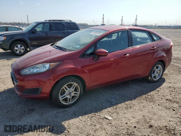 2017 Ford Fiesta SE z VIN 3FADP4BJ2HM112758, wystawiony jako Copart lot #46955455 z przebiegiem 115 377 mil mil oraz Czysty tytuł • Clean title. Historia ofert i sprzedaży dostępna na DreamBid. Obrazek 1.