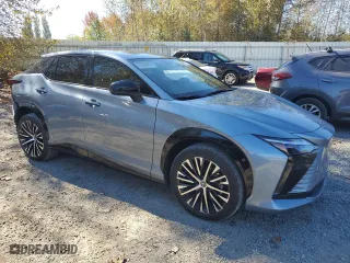 2023 Lexus RZ with VIN JTJAAAAB8PA014561, listed as a Copart auction lot 72955124 with 5,230 mi miles and Salvage Title. Bid and sale history available at carsss.com. Image 4.