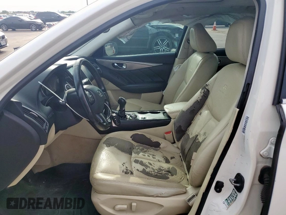 2014 Infiniti Q50 Premium with VIN JN1BV7AP6EM676258, listed as a Copart auction lot 63979615 with 191,948 mi miles and Salvage title. Bid and sale history available at DreamBid. Image 7.