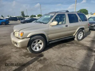 2002 Nissan Pathfinder SE z VIN JN8DR09X22W654672, wystawiony jako Copart lot #59880435 z przebiegiem 142 352 mil mil oraz Szkoda całkowita • Salvage title. Historia ofert i sprzedaży dostępna na DreamBid. Obrazek 1.