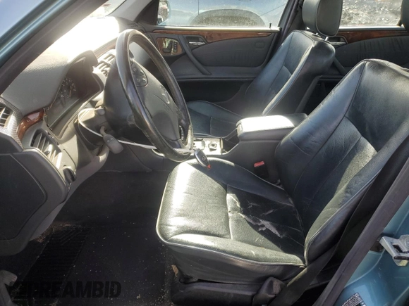 2002 Mercedes-Benz E-Class with VIN WDBJF82J62X062020, listed as a Copart auction lot 48318085 with 163,836 mi miles and Salvage Title. Bid and sale history available at carsss.com. Image 7.