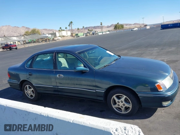 1998 Toyota Avalon XL with VIN 4T1BF18BXWU267131, listed as a IAAI auction lot 41518513 with 208,023 mi miles and . Bid and sale history available at DreamBid. Image 13.
