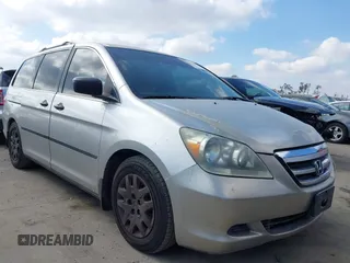 2007 Honda Odyssey LX with VIN 5FNRL38217B094522, listed as a IAAI auction lot 41548803 with 215,576 mi miles. Bid and sale history available at carsss.com. Image 1.