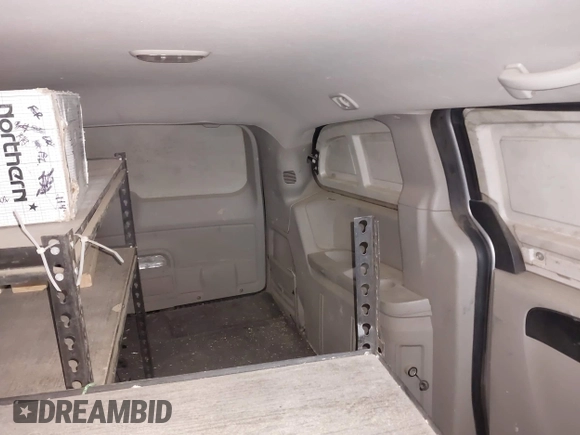 2014 Ram Cargo Van with VIN 2C4RRGAG9ER312915, listed as a IAAI auction lot 41947886 with 149,144 mi miles and . Bid and sale history available at DreamBid. Image 8.
