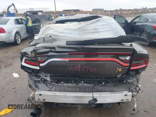 2020 Dodge Charger Scat Pack z VIN 2C3CDXGJXLH107344, wystawiony jako IAAI lot #41888453 z przebiegiem Nie podano mil oraz . Historia ofert i sprzedaży dostępna na DreamBid. Obrazek 6.