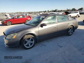 2005 Nissan Altima SE-R with VIN 1N4BL11D15C277050, listed as a Copart auction lot 74563134 with 195,098 mi miles and Salvage title. Bid and sale history available at DreamBid. Image 1.