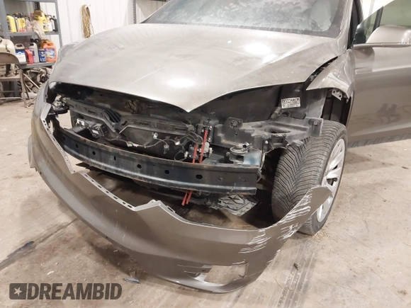 2016 Tesla Model X 70D with VIN 5YJXCBE27GF004974, listed as a IAAI auction lot 41630556 with 167,709 mi miles. Bid and sale history available at carsss.com. Image 6.