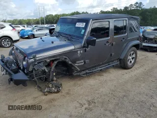 2017 Jeep Wrangler Unlimited Sport with VIN 1C4BJWDG8HL680627, listed as a Copart auction lot 61241735 with 100,890 mi miles and Salvage title. Bid and sale history available at DreamBid. Image 1.