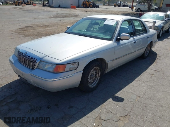 2002 Mercury Grand Marquis LS Premium z VIN 2MEFM75W82X653148, wystawiony jako IAAI lot #42307985 z przebiegiem 92 233 mil mil oraz . Historia ofert i sprzedaży dostępna na DreamBid. Obrazek 2.