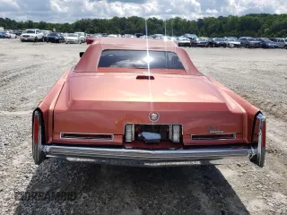 1976 Cadillac Eldorado z VIN 6L67S6Q181256, wystawiony jako Copart lot #56729155 z przebiegiem 51 956 mil mil oraz Szkody całkowita. Historia ofert i sprzedaży dostępna na DreamBid. Obrazek 6.