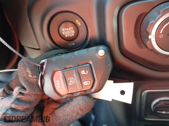 2019 Jeep Wrangler Unlimited Sport S with VIN 1C4HJXDG0KW541940, listed as a IAAI auction lot 42100255 with 68,309 mi miles and . Bid and sale history available at DreamBid. Image 11.