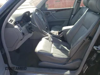 2001 Mercedes-Benz E-Class with VIN WDBJF65J01B325792, listed as a Copart auction lot 76328704 with 101,886 mi miles and Salvage Title. Bid and sale history available at carsss.com. Image 7.