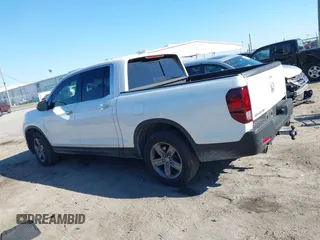2021 Honda Ridgeline RTL-E with VIN 5FPYK3F7XMB011525, listed as a IAAI auction lot 41774012 with 98,031 mi miles and . Bid and sale history available at DreamBid. Image 14.