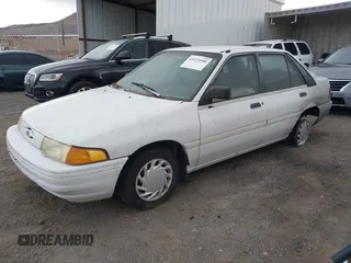 1993 Ford Escort z VIN 1FAPP14J0PW114239, wystawiony jako IAAI lot #41473100 z przebiegiem 98 559 mil mil oraz . Historia ofert i sprzedaży dostępna na DreamBid. Obrazek 2.