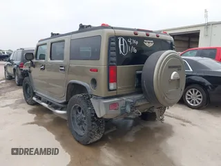 2005 Hummer H2 SUV z VIN 5GRGN23U95H132238, wystawiony jako IAAI lot #41809909 z przebiegiem 300 293 mil mil oraz . Historia ofert i sprzedaży dostępna na DreamBid. Obrazek 3.