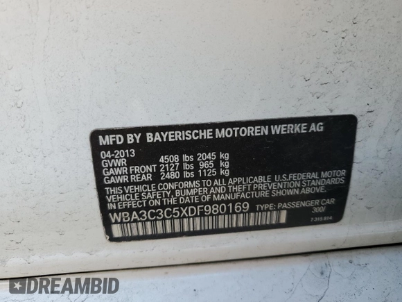 2013 BMW 3 Series 320i xDrive with VIN WBA3C3C5XDF980169, listed as a Copart auction lot 52717675 with 119,297 mi miles and Salvage title. Bid and sale history available at DreamBid. Image 12.