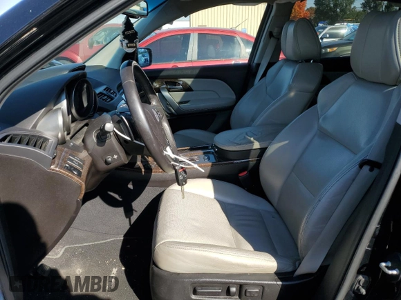 2010 Acura MDX Advance with VIN 2HNYD2H53AH533597, listed as a Copart auction lot 77006174 with 123,981 mi miles and Salvage Title. Bid and sale history available at DreamBid. Image 7.