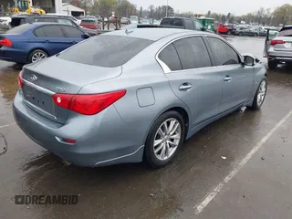 2015 Infiniti Q50 Premium with VIN JN1BV7AR4FM393974, listed as a IAAI auction lot 41874345 with 148,228 mi miles. Bid and sale history available at carsss.com. Image 4.