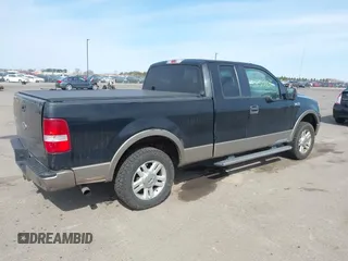 2006 Ford F-150 XLT with VIN 1FTPX12536NA71374, listed as a IAAI auction lot 42038669 with 257,323 mi miles. Bid and sale history available at carsss.com. Image 4.