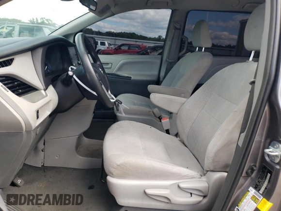 2019 Toyota Sienna L with VIN 5TDZZ3DC8KS006907, listed as a Copart auction lot 70310274 with 73,234 mi miles and Salvage Title. Bid and sale history available at carsss.com. Image 7.