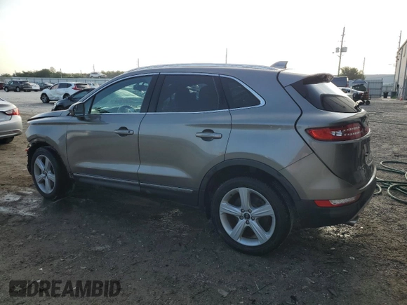 2017 Lincoln MKC Premiere z VIN 5LMCJ1C95HUL16078, wystawiony jako Copart lot #55853005 z przebiegiem 114 821 mil mil oraz Szkoda całkowita • Salvage title. Historia ofert i sprzedaży dostępna na DreamBid. Obrazek 2.